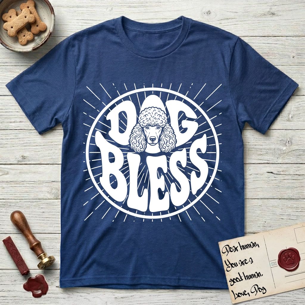 Dog Bless Poodle T-Shirt flat lay in Royal, featuring Retro bubble-letter badge reading DOG BLESS with a Poodle face with curly topknot and long curled ears framed in the letter O, hand-drawn sunburst rays radiating outward.