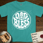 Dog Bless Poodle T-Shirt flat lay in Seafoam, featuring Retro bubble-letter badge reading DOG BLESS with a Poodle face with curly topknot and long curled ears framed in the letter O, hand-drawn sunburst rays radiating outward.