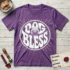 Dog Bless Pug T-Shirt flat lay in Heather Purple, featuring Retro bubble-letter badge reading DOG BLESS with a wrinkled Pug face with large round eyes framed in the letter O, hand-drawn sunburst rays radiating outward.