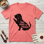 Serenity Basset Hound T-Shirt flat lay in Coral Silk, featuring Distressed black screen print silhouette of a Basset Hound sitting in profile with one paw raised and long ears hanging, the words DOG GRANT ME SERENITY showing through his body in the shirt color.