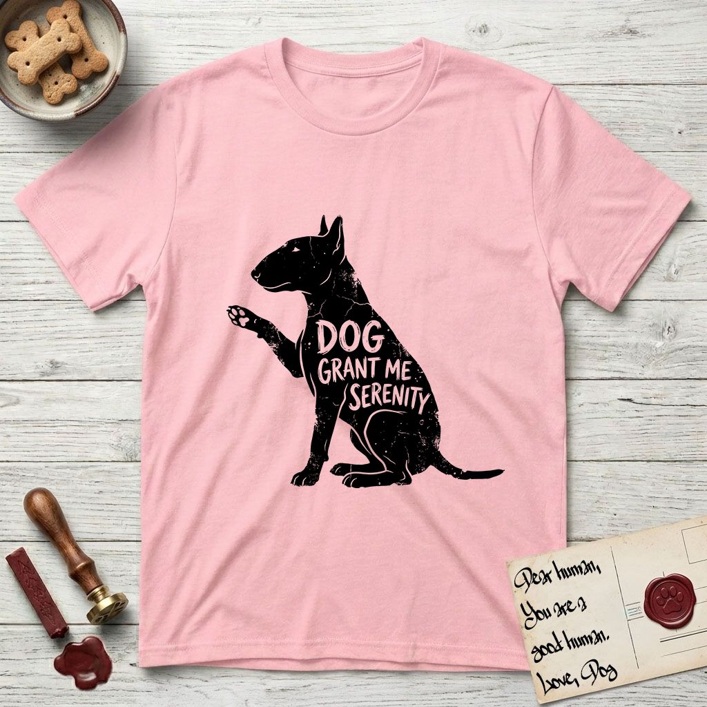 Serenity Bull Terrier T-Shirt flat lay in Light Pink, featuring Distressed black screen print silhouette of a Bull Terrier sitting in profile with one paw raised and an egg-shaped head, the words DOG GRANT ME SERENITY showing through her body in the shirt color.