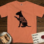 Serenity Bull Terrier T-Shirt flat lay in Melon, featuring Distressed black screen print silhouette of a Bull Terrier sitting in profile with one paw raised and an egg-shaped head, the words DOG GRANT ME SERENITY showing through her body in the shirt color.