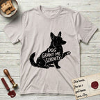 Serenity Corgi T-Shirt flat lay in Ice Grey, featuring Distressed black screen print silhouette of a Corgi sitting in profile with one paw raised, upright ears and a full brush tail, the words DOG GRANT ME SERENITY showing through his body in the shirt color.