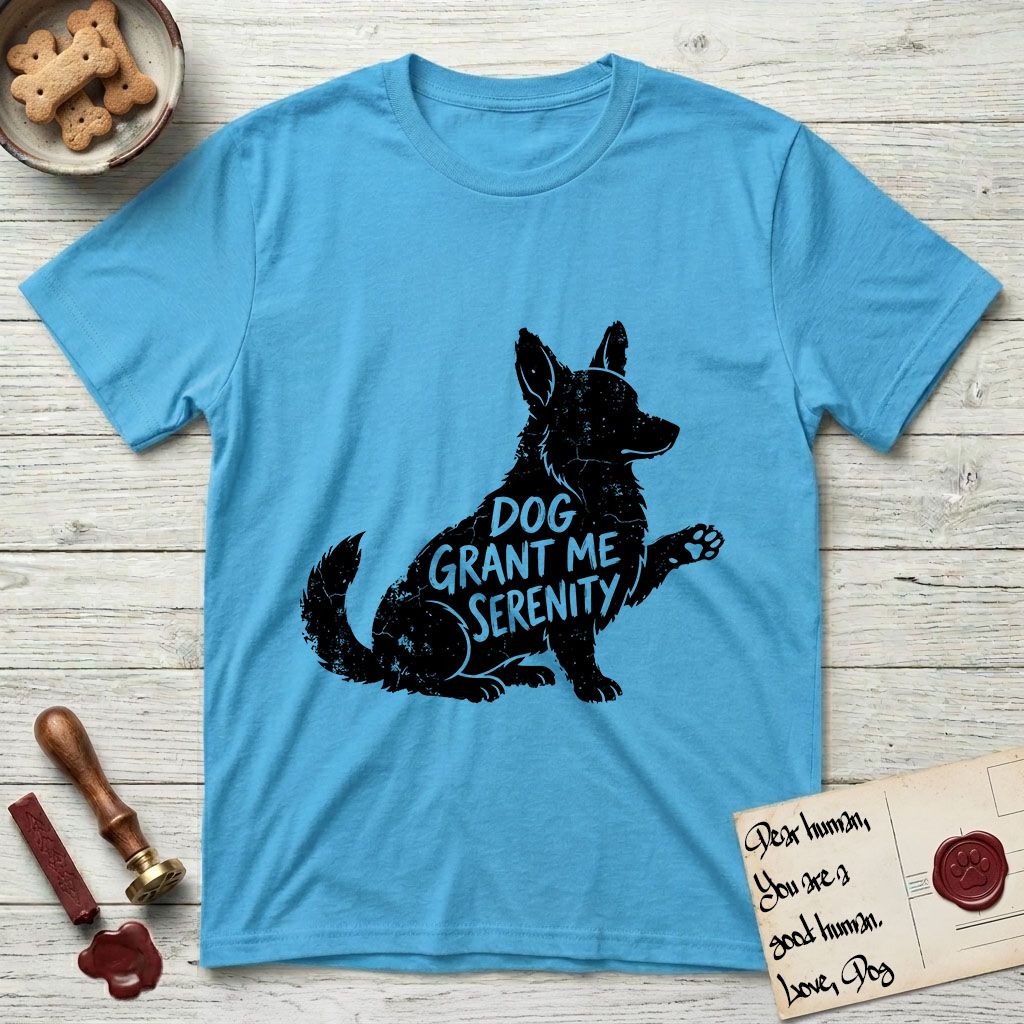 Serenity Corgi T-Shirt flat lay in Sky, featuring Distressed black screen print silhouette of a Corgi sitting in profile with one paw raised, upright ears and a full brush tail, the words DOG GRANT ME SERENITY showing through his body in the shirt color.