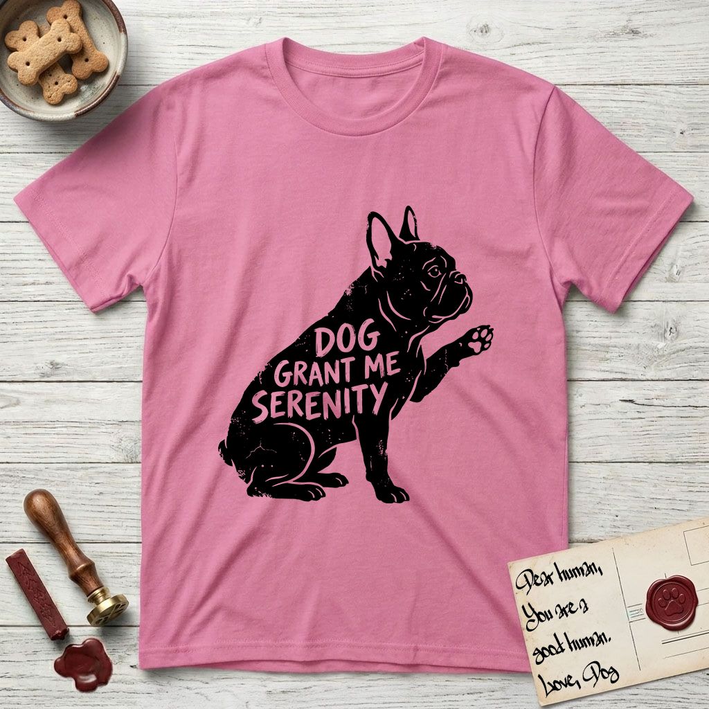 Serenity French Bulldog T-Shirt flat lay in Azalea, featuring Distressed black screen print silhouette of a French Bulldog sitting in profile with one paw raised and large upright bat ears, the words DOG GRANT ME SERENITY showing through his body in the shirt color.