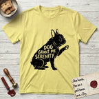 Serenity French Bulldog T-Shirt flat lay in Cornsilk, featuring Distressed black screen print silhouette of a French Bulldog sitting in profile with one paw raised and large upright bat ears, the words DOG GRANT ME SERENITY showing through his body in the shirt color.