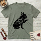 Serenity French Bulldog T-Shirt flat lay in Sage, featuring Distressed black screen print silhouette of a French Bulldog sitting in profile with one paw raised and large upright bat ears, the words DOG GRANT ME SERENITY showing through his body in the shirt color.