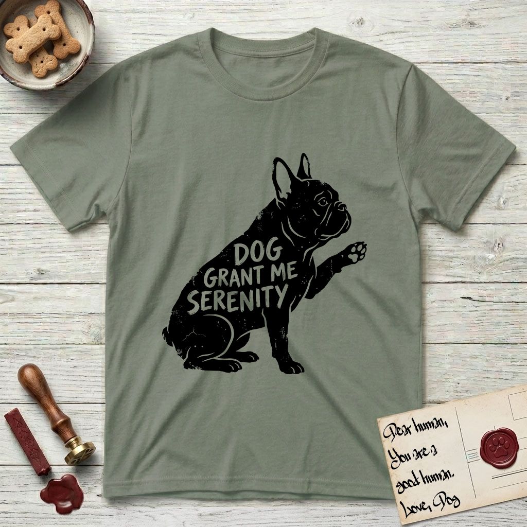 Serenity French Bulldog T-Shirt flat lay in Sage, featuring Distressed black screen print silhouette of a French Bulldog sitting in profile with one paw raised and large upright bat ears, the words DOG GRANT ME SERENITY showing through his body in the shirt color.