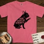 Serenity French Bulldog T-Shirt flat lay in Watermelon, featuring Distressed black screen print silhouette of a French Bulldog sitting in profile with one paw raised and large upright bat ears, the words DOG GRANT ME SERENITY showing through his body in the shirt color.