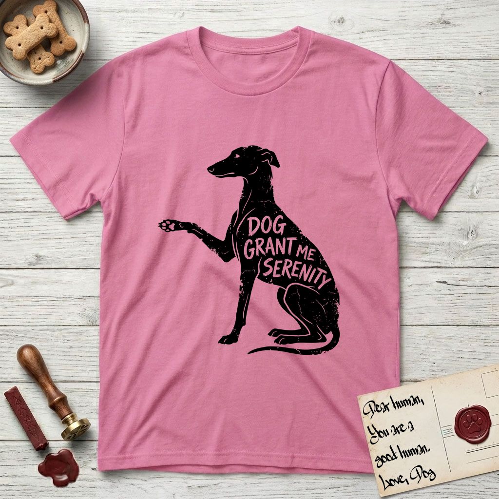 Serenity Greyhound T-Shirt flat lay in Azalea, featuring Distressed black screen print silhouette of a Greyhound sitting in profile with one paw raised, an arched back and a long whip tail, the words DOG GRANT ME SERENITY showing through her body in the shirt color.