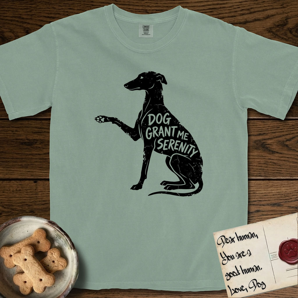 Serenity Greyhound T-Shirt flat lay in Bay, featuring Distressed black screen print silhouette of a Greyhound sitting in profile with one paw raised, an arched back and a long whip tail, the words DOG GRANT ME SERENITY showing through her body in the shirt color.
