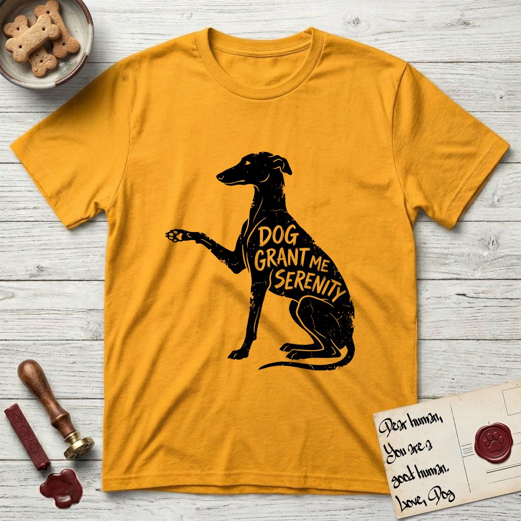 Serenity Greyhound T-Shirt flat lay in Gold, featuring Distressed black screen print silhouette of a Greyhound sitting in profile with one paw raised, an arched back and a long whip tail, the words DOG GRANT ME SERENITY showing through her body in the shirt color.