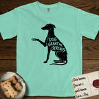Serenity Greyhound T-Shirt flat lay in Island Reef, featuring Distressed black screen print silhouette of a Greyhound sitting in profile with one paw raised, an arched back and a long whip tail, the words DOG GRANT ME SERENITY showing through her body in the shirt color.