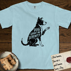 Serenity Lobo T-Shirt flat lay in Chambray, featuring Distressed black screen print silhouette of a black and white Cattle Dog and Pitbull mix sitting in profile with one paw raised, a white blaze, white chest and white tail tip, the words DOG GRANT ME SERENITY showing through his body in the shirt color.