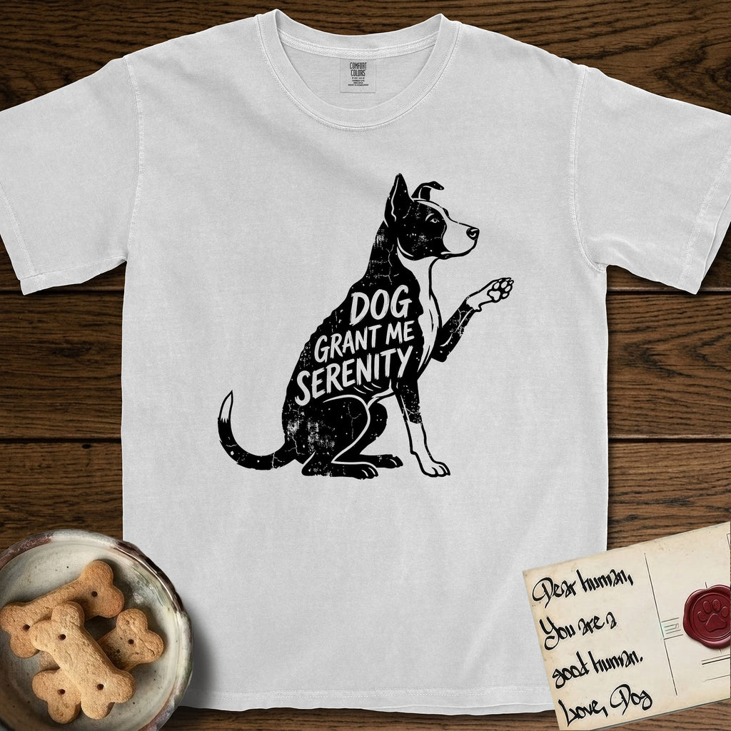 Serenity Lobo T-Shirt flat lay in White, featuring Distressed black screen print silhouette of a black and white Cattle Dog and Pitbull mix sitting in profile with one paw raised, a white blaze, white chest and white tail tip, the words DOG GRANT ME SERENITY showing through his body in the shirt color.