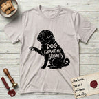 Serenity Pug T-Shirt flat lay in Ice Grey, featuring Distressed black screen print silhouette of a Pug sitting in profile with one paw raised, a wrinkled face and a tightly curled tail, the words DOG GRANT ME SERENITY showing through his body in the shirt color.