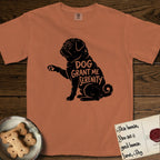 Serenity Pug T-Shirt flat lay in Yam, featuring Distressed black screen print silhouette of a Pug sitting in profile with one paw raised, a wrinkled face and a tightly curled tail, the words DOG GRANT ME SERENITY showing through his body in the shirt color.