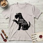 Serenity Schnauzer T-Shirt flat lay in Ice Grey, featuring Distressed black screen print silhouette of a Schnauzer sitting in profile with one paw raised, a long beard and bushy eyebrows, the words DOG GRANT ME SERENITY showing through her body in the shirt color.