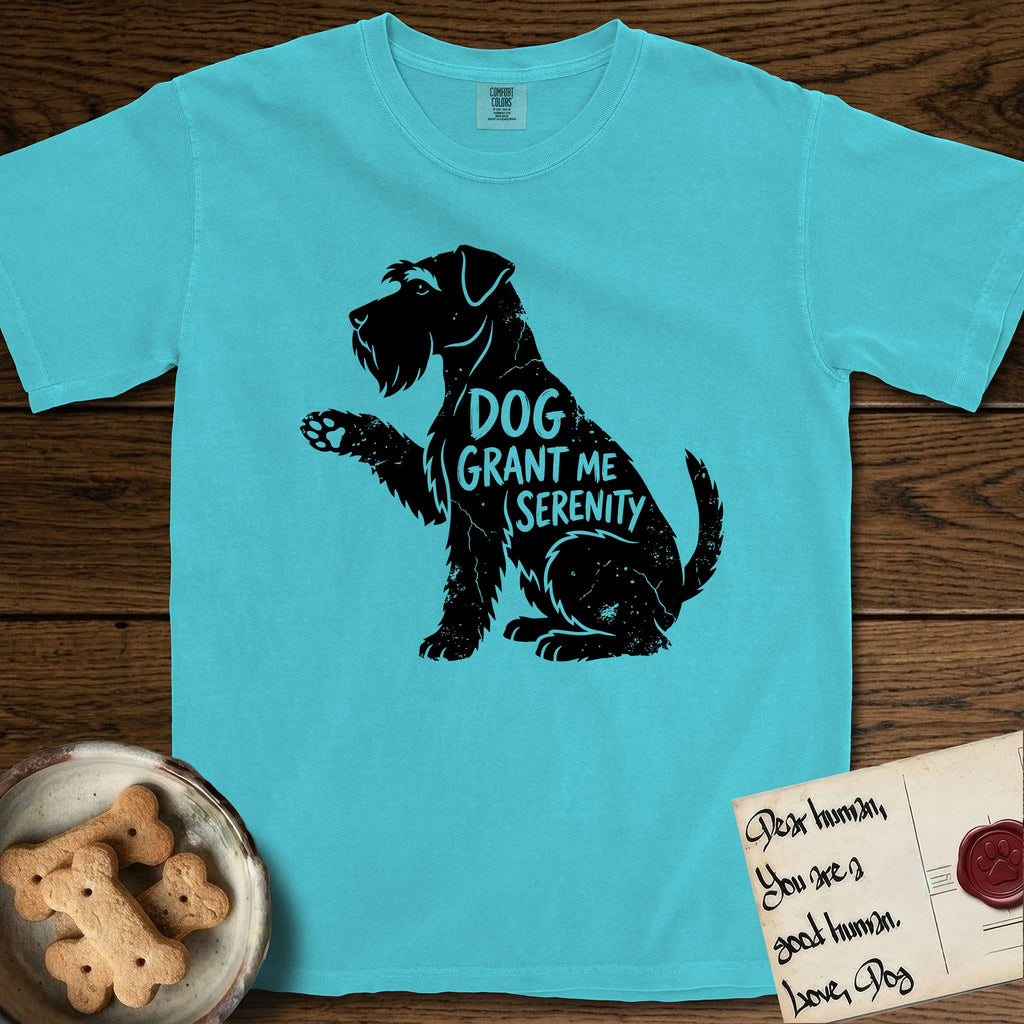 Serenity Schnauzer T-Shirt flat lay in Lagoon Blue, featuring Distressed black screen print silhouette of a Schnauzer sitting in profile with one paw raised, a long beard and bushy eyebrows, the words DOG GRANT ME SERENITY showing through her body in the shirt color.