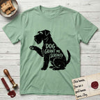Serenity Schnauzer T-Shirt flat lay in Mint Green, featuring Distressed black screen print silhouette of a Schnauzer sitting in profile with one paw raised, a long beard and bushy eyebrows, the words DOG GRANT ME SERENITY showing through her body in the shirt color.