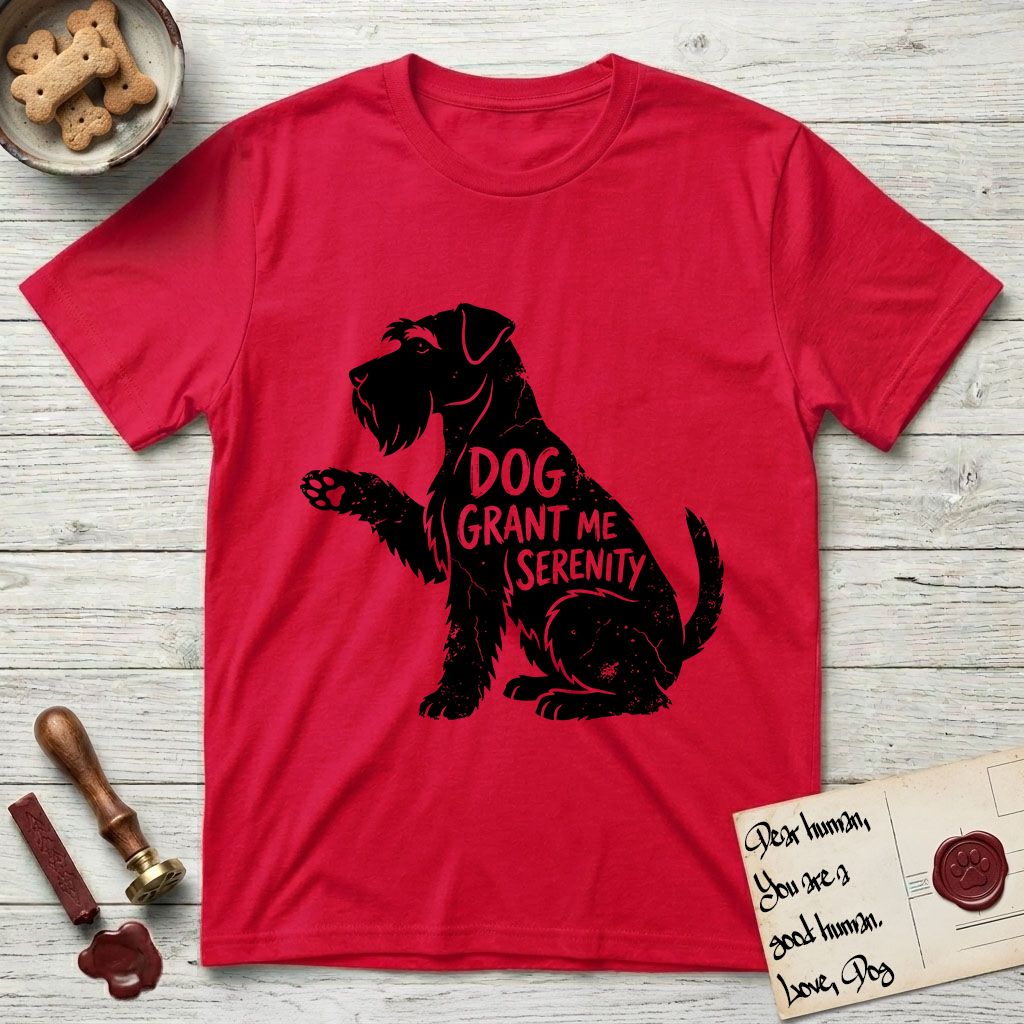 Serenity Schnauzer T-Shirt flat lay in Red, featuring Distressed black screen print silhouette of a Schnauzer sitting in profile with one paw raised, a long beard and bushy eyebrows, the words DOG GRANT ME SERENITY showing through her body in the shirt color.