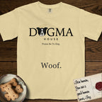 Dogma House Dark Logo T-Shirt flat lay in Butter, featuring the Dogma House wordmark in dark ink with Lobo the mascot forming the O, a halo above him, and HOUSE below.