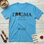 Dogma House Dark Logo T-Shirt flat lay in Sky, featuring the Dogma House wordmark in dark ink with Lobo the mascot forming the O, a halo above him, and HOUSE below.