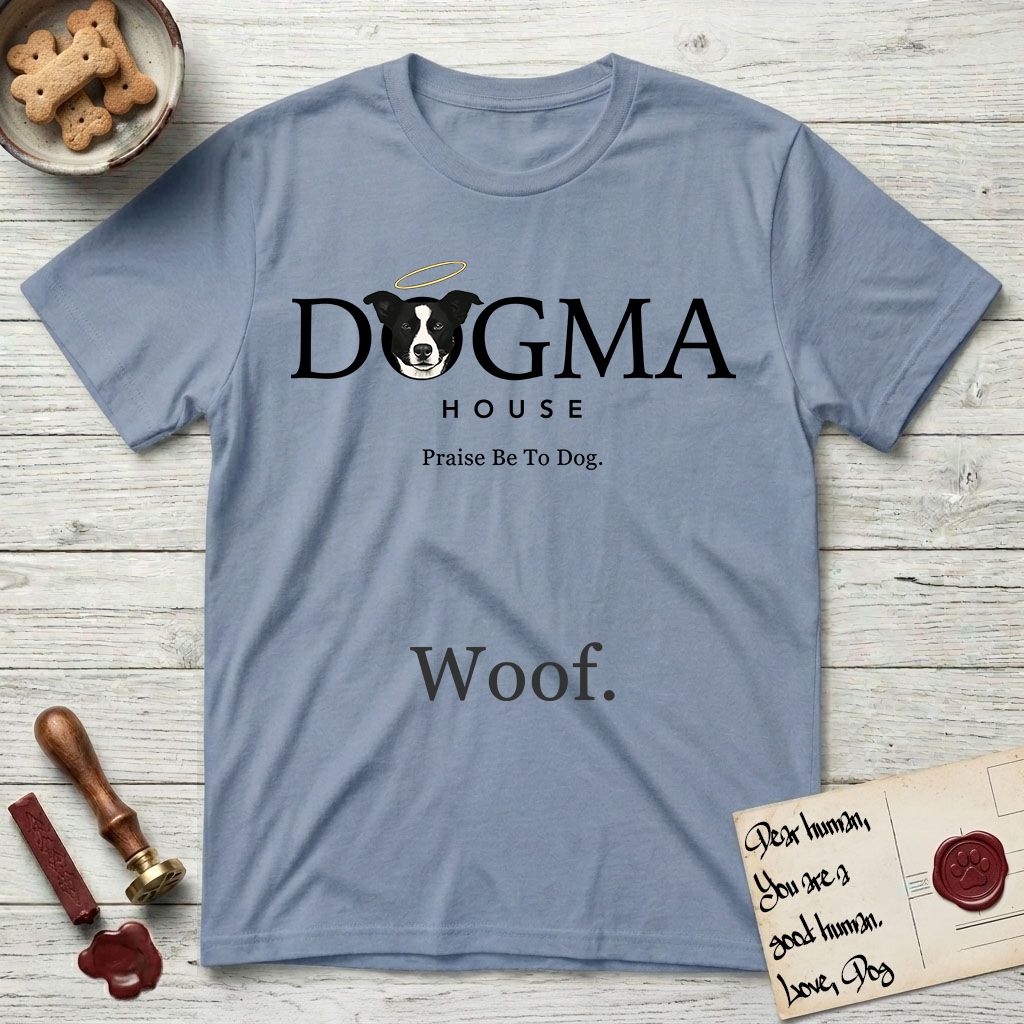 Dogma House Dark Logo T-Shirt flat lay in Stone Blue, featuring the Dogma House wordmark in dark ink with Lobo the mascot forming the O, a halo above him, and HOUSE below.