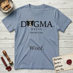 Dogma House Dark Logo T-Shirt flat lay in Stone Blue, featuring the Dogma House wordmark in dark ink with Lobo the mascot forming the O, a halo above him, and HOUSE below.