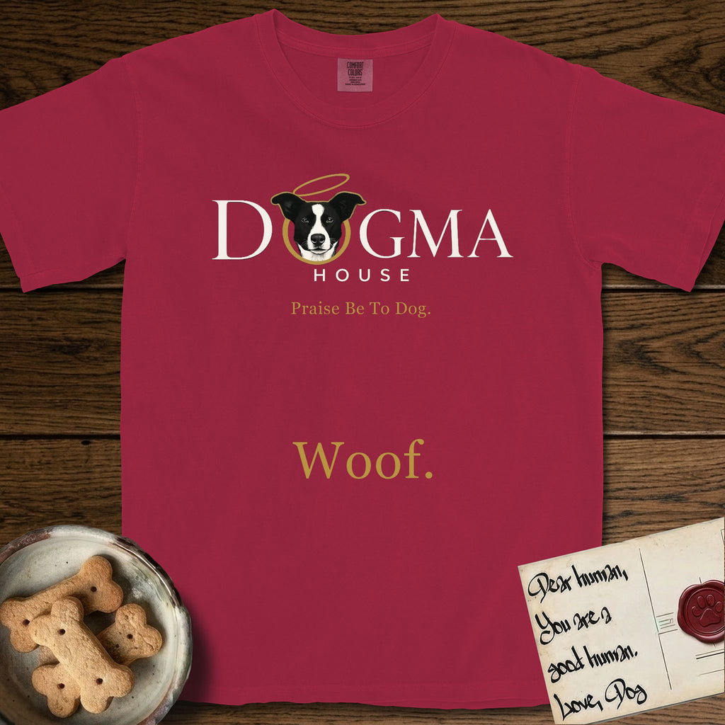 Dogma House Light Logo T-Shirt flat lay in Chili, featuring the Dogma House wordmark in light ink with Lobo the mascot forming the O, a gold halo above him, and Woof below.