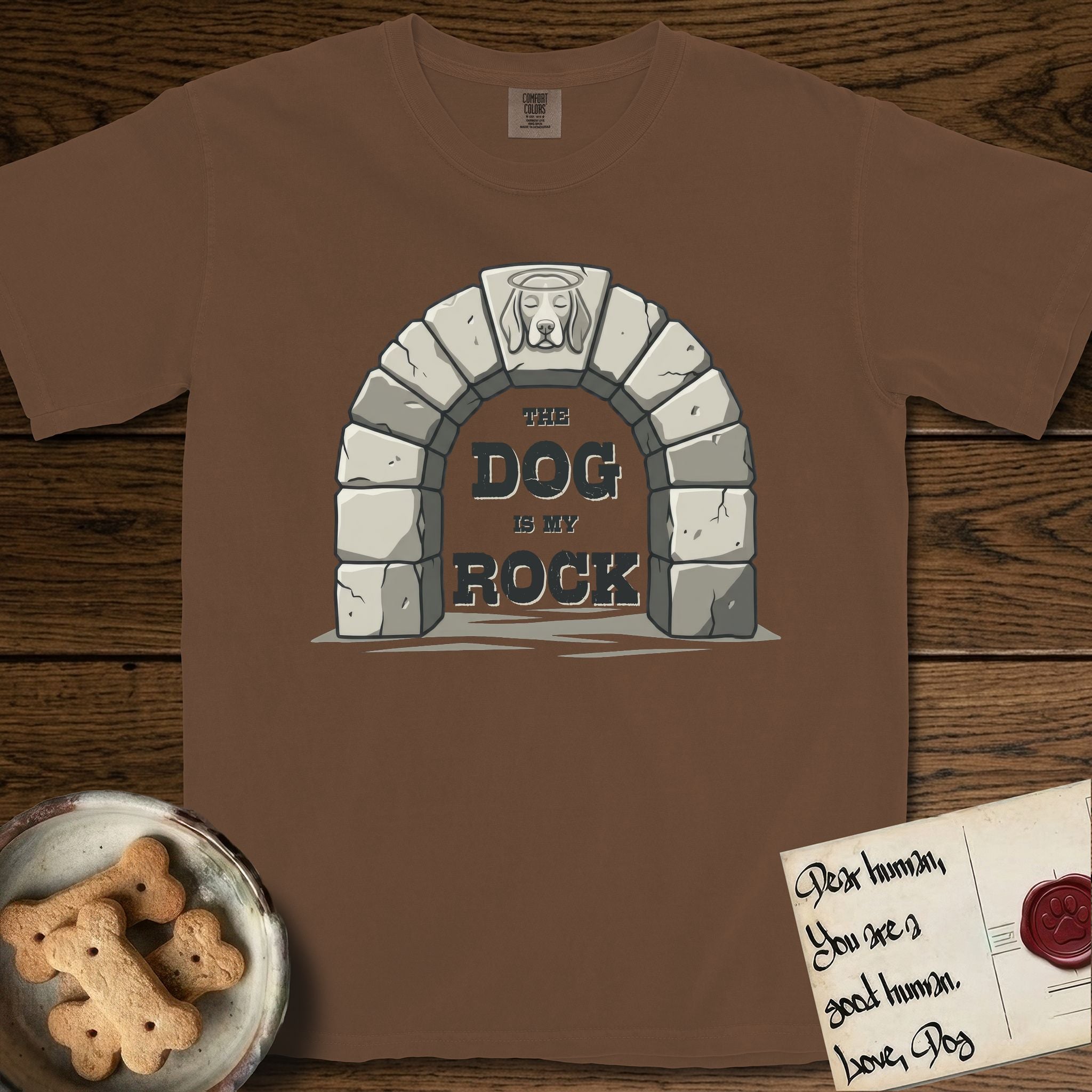 DIMR Beagle T-Shirt flat lay in Espresso, featuring carved gray stone arch with a Beagle's face in shallow relief on the keystone and a halo above, with the words the Dog is my Rock.