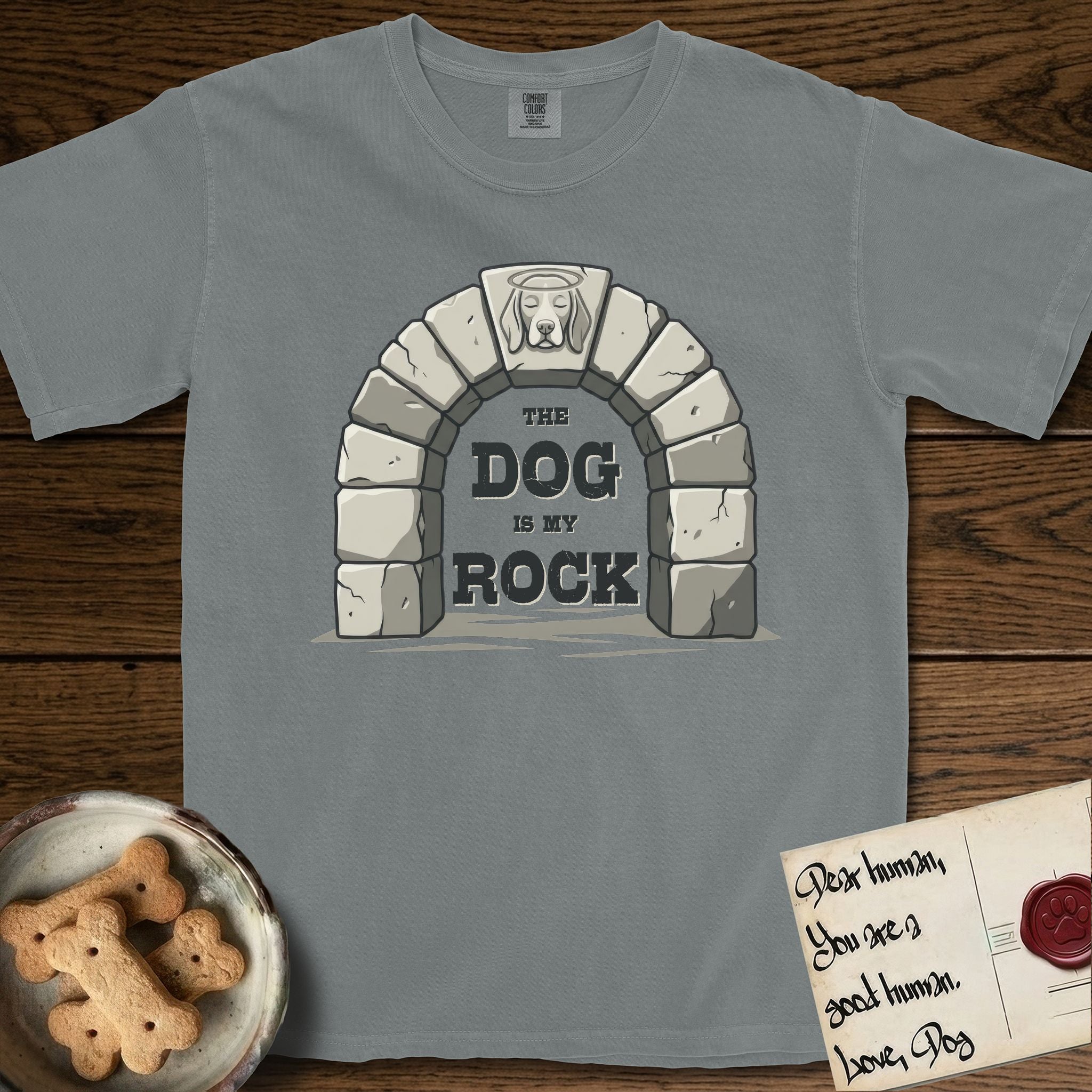DIMR Beagle T-Shirt flat lay in Granite, featuring carved gray stone arch with a Beagle's face in shallow relief on the keystone and a halo above, with the words the Dog is my Rock.