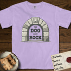 DIMR Beagle T-Shirt flat lay in Orchid, featuring carved gray stone arch with a Beagle's face in shallow relief on the keystone and a halo above, with the words the Dog is my Rock.