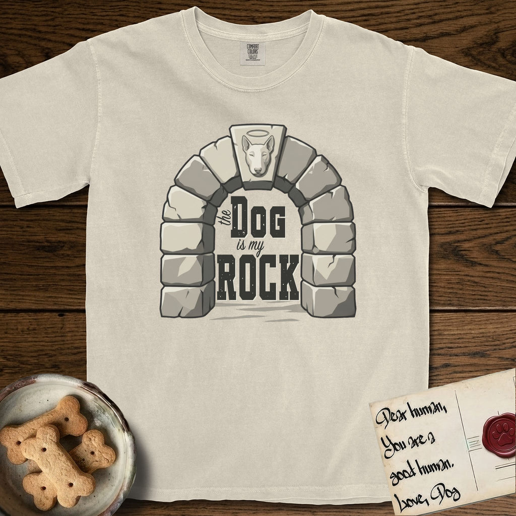 DIMR Bull Terrier T-Shirt flat lay in Ivory, featuring carved gray stone arch with a Bull Terrier's face in shallow relief on the keystone and a halo above, with the words the Dog is my Rock.