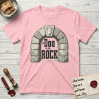 DIMR Bull Terrier T-Shirt flat lay in Light Pink, featuring carved gray stone arch with a Bull Terrier's face in shallow relief on the keystone and a halo above, with the words the Dog is my Rock.