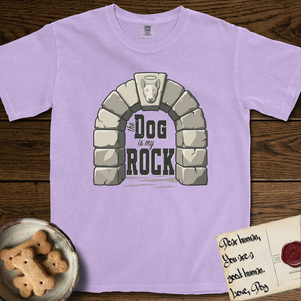 DIMR Bull Terrier T-Shirt flat lay in Orchid, featuring carved gray stone arch with a Bull Terrier's face in shallow relief on the keystone and a halo above, with the words the Dog is my Rock.