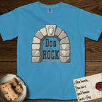 DIMR Bull Terrier T-Shirt flat lay in Royal Caribe, featuring carved gray stone arch with a Bull Terrier's face in shallow relief on the keystone and a halo above, with the words the Dog is my Rock.