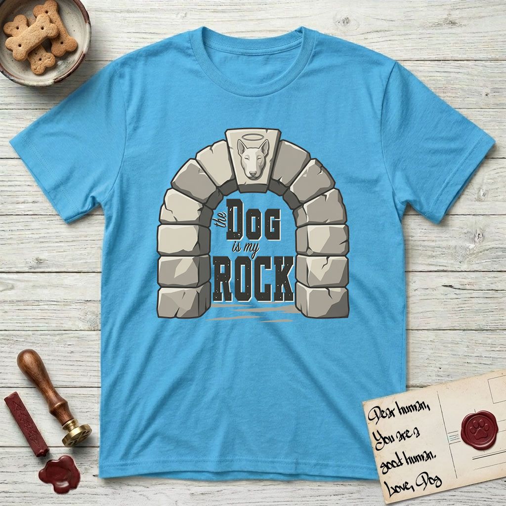DIMR Bull Terrier T-Shirt flat lay in Sky, featuring carved gray stone arch with a Bull Terrier's face in shallow relief on the keystone and a halo above, with the words the Dog is my Rock.