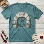DIMR French Bulldog T-Shirt flat lay in Heather Galapagos Blue, featuring carved gray stone arch with a French Bulldog's face in shallow relief on the keystone and a halo above, with the words the Dog is my Rock.