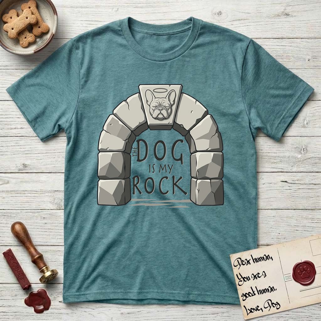 DIMR French Bulldog T-Shirt flat lay in Heather Galapagos Blue, featuring carved gray stone arch with a French Bulldog's face in shallow relief on the keystone and a halo above, with the words the Dog is my Rock.