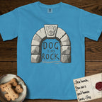 DIMR French Bulldog T-Shirt flat lay in Royal Caribe, featuring carved gray stone arch with a French Bulldog's face in shallow relief on the keystone and a halo above, with the words the Dog is my Rock.