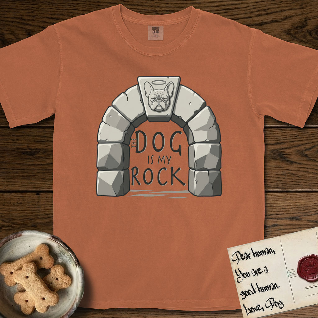 DIMR French Bulldog T-Shirt flat lay in Yam, featuring carved gray stone arch with a French Bulldog's face in shallow relief on the keystone and a halo above, with the words the Dog is my Rock.