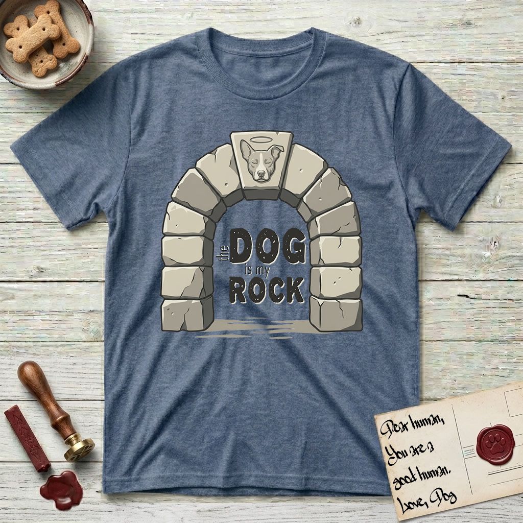 DIMR Lobo T-Shirt flat lay in Heather Indigo, featuring carved gray stone arch with Lobo's Cattle Dog face in shallow relief on the keystone and a halo above, with the words the Dog is my Rock.
