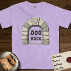 DIMR Lobo T-Shirt flat lay in Orchid, featuring carved gray stone arch with Lobo's Cattle Dog face in shallow relief on the keystone and a halo above, with the words the Dog is my Rock.