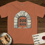 DIMR Lobo T-Shirt flat lay in Yam, featuring carved gray stone arch with Lobo's Cattle Dog face in shallow relief on the keystone and a halo above, with the words the Dog is my Rock.