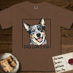 Dog Loves You Australian Cattle Dog T-Shirt flat lay in Espresso, featuring Ink and watercolor portrait of a smiling blue Australian Cattle Dog with a speckled coat, tan eyebrows and upright ears, head tilted inside a black frame above hand-lettered text reading DOG LOVES YOU.
