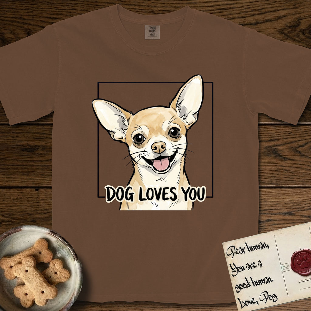 Dog Loves You Chihuahua T-Shirt flat lay in Espresso, featuring Ink and watercolor portrait of a smiling fawn Chihuahua with enormous upright bat ears and big round dark eyes, head tilted inside a black frame above hand-lettered text reading DOG LOVES YOU.