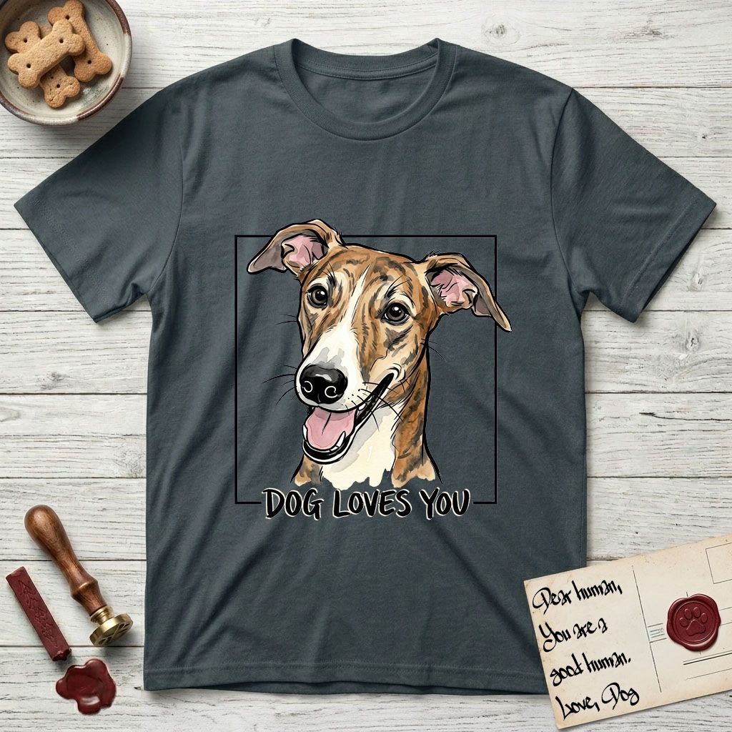 Dog Loves You Galgo T-Shirt flat lay in Dark Heather Grey, featuring Ink and watercolor portrait of a smiling brindle Galgo with a long narrow muzzle and folded rose ears, head tilted inside a black frame above hand-lettered text reading DOG LOVES YOU.