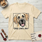 Dog Loves You Great Dane T-Shirt flat lay in Natural, featuring Ink and watercolor portrait of a smiling fawn Great Dane with a black mask and natural floppy ears, head tilted inside a black frame above hand-lettered text reading DOG LOVES YOU.