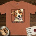 Dog Loves You Jack Russell T-Shirt flat lay in Yam, featuring Ink and watercolor portrait of a smiling cream and rust Jack Russell with folded button ears and keen dark eyes, head tilted inside a black frame above hand-lettered text reading DOG LOVES YOU.